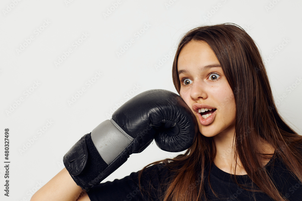 athletic woman boxing black gloves posing sports boxing punch light background athletic woman boxing black gloves posing sports boxing punch light background
