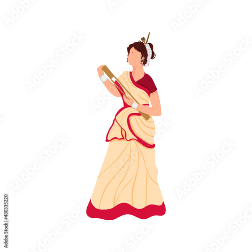 Faceless Young Lady Holding Toka Instrument In Assam Traditional Dress.