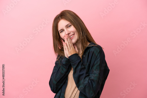 Young English woman isolated on pink background keeps palm together. Person asks for something
