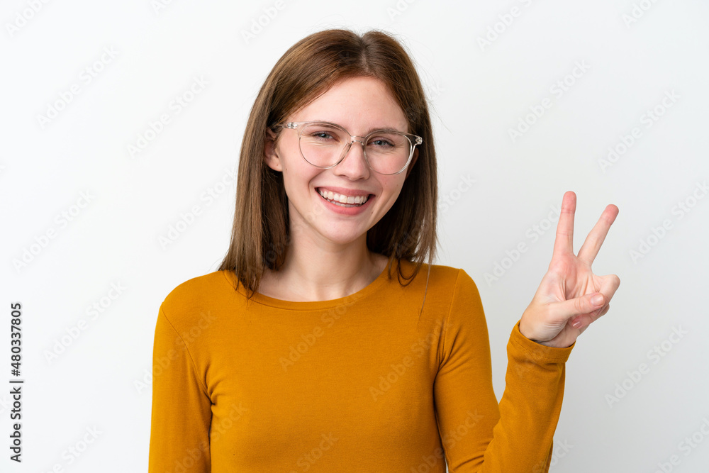 Young English woman isolated on white background With glasses and doing OK sign Young English woman isolated on white background With glasses and doing OK sign