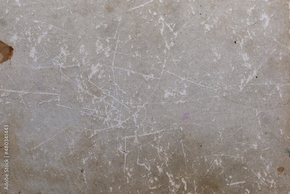 Old scratched cardboard book cover. Cardboard texture, abstract background. Old scratched cardboard book cover. Cardboard texture, abstract background.