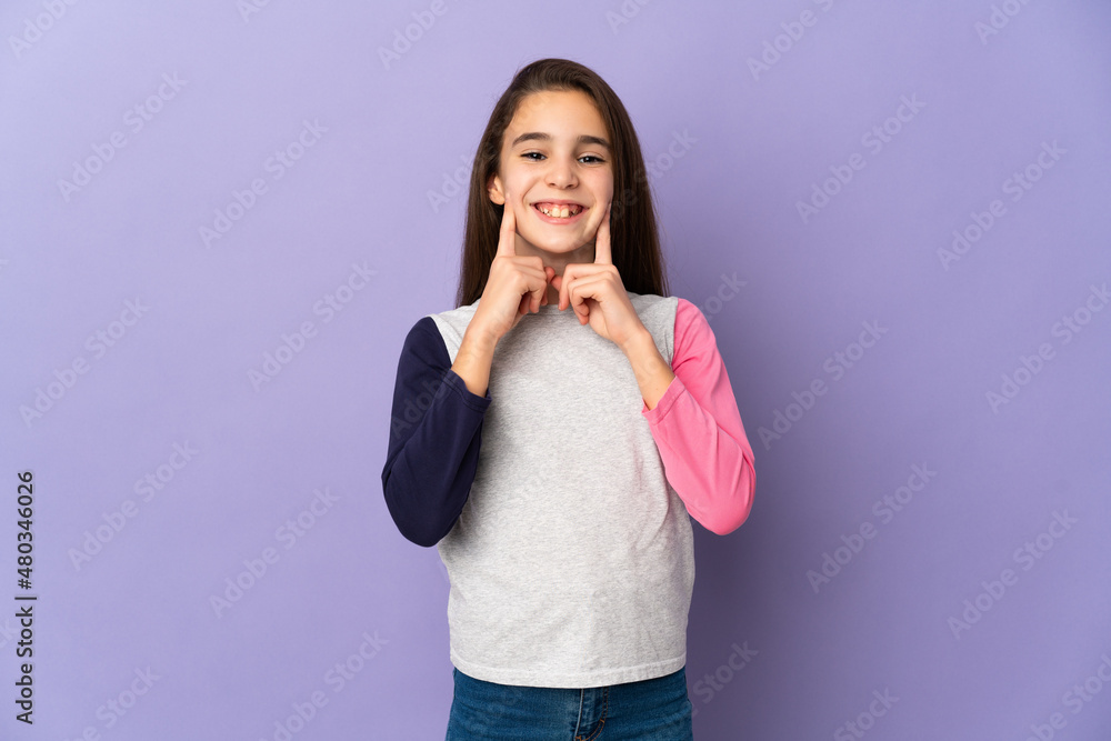 Little girl isolated on purple background smiling with a happy and pleasant expression Little girl isolated on purple background smiling with a happy and pleasant expression