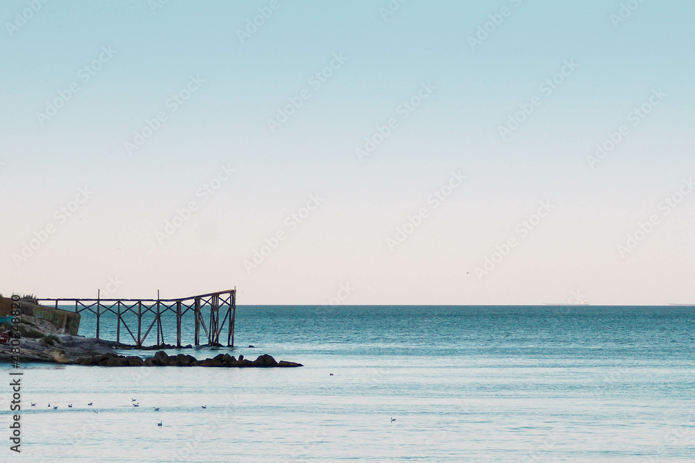 Still clear blue sea and sky background view Still clear blue sea and sky background view