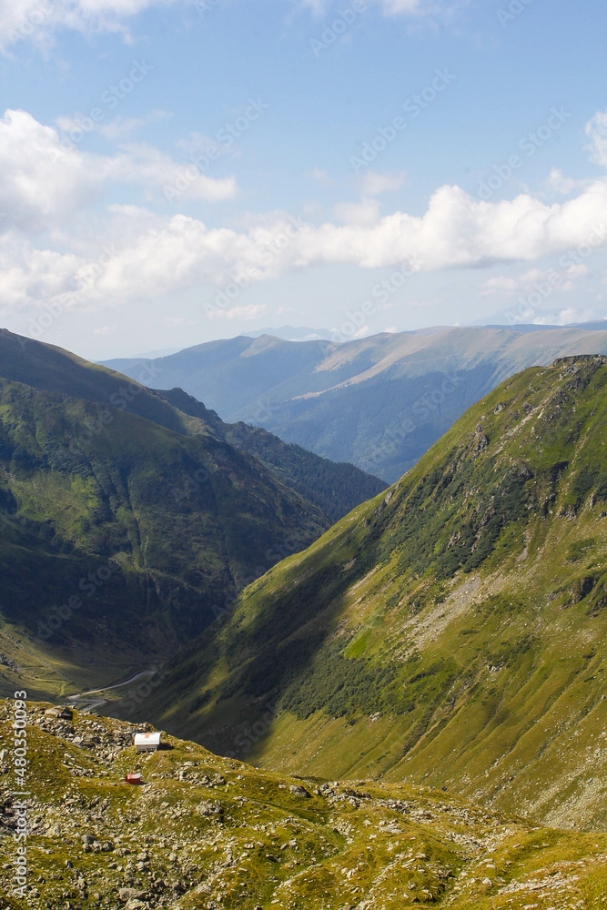 Beautiful mountain landscape with a rescue house