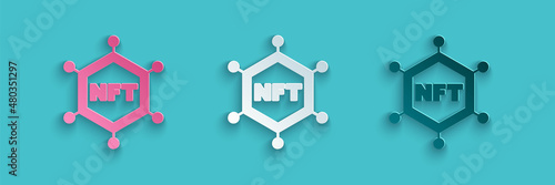 Paper cut NFT blockchain technology icon isolated on blue background. Non fungible token. Digital crypto art concept. Paper art style. Vector