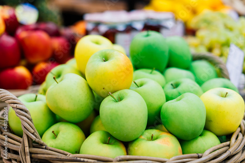 Big choice of fresh fruits and vegetables on market counter