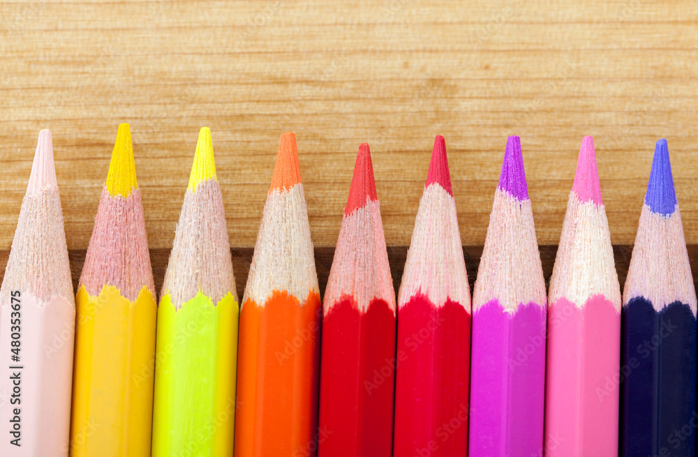 Close Up of Colorful Pencils on Wooden Table Close Up of Colorful Pencils on Wooden Table