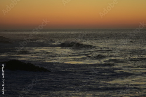 waves at sunset in the Canary Island contemplating its colors and horizon