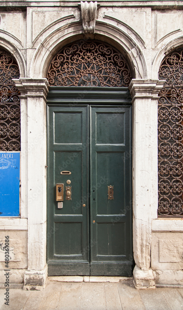 Old front door. Venice in Italy.