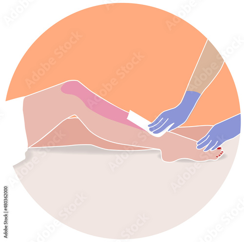 Woman legs waxing at the salon