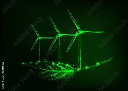 Futuristic green sustainable energy concept with glowing low polygonal wind generators and