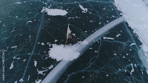 Winter sports on Baikal. Buer. Sailing on skates on the ice of the lake