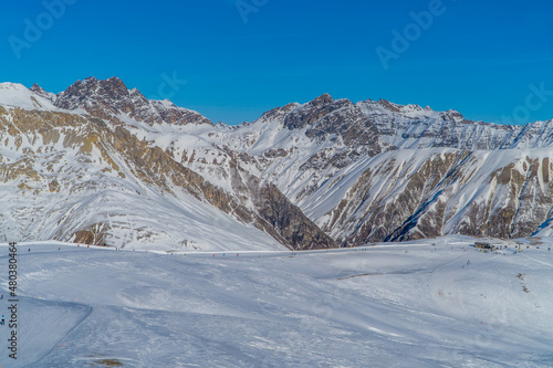Panoramic view of skiers on the slopes of the ski resort of Livigno, Italy