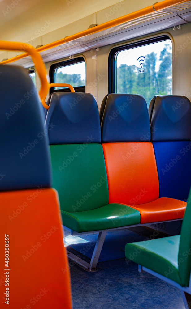 Fototapeta premium train seats in different bright colors