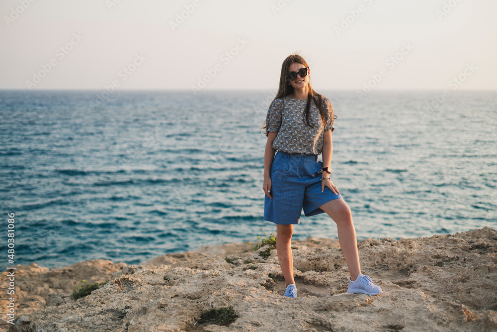 young smiling beautiful woman authentic lifestyle portrait outdoors