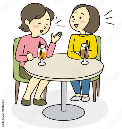 Two women talking in a cafe