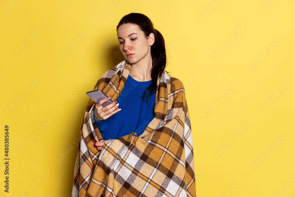 Portrait of Caucasian young woman flu and cold, feeling sick posing isolated on yellow studio background. Portrait of Caucasian young woman flu and cold, feeling sick posing isolated on yellow studio background.