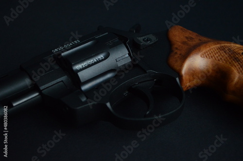 a flobert revolver on the black background photo