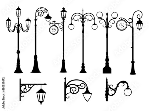 Set of silhouettes street lamp. Collection of city vintage street light. Decorative street lantern in retro style. Vector illustration on whitw background. photo