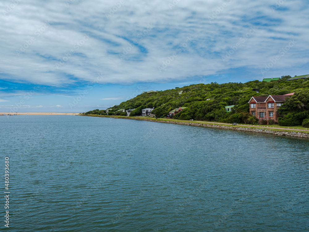 kleinemonde beach front and houses on the river bank in Port Alfred South Africa