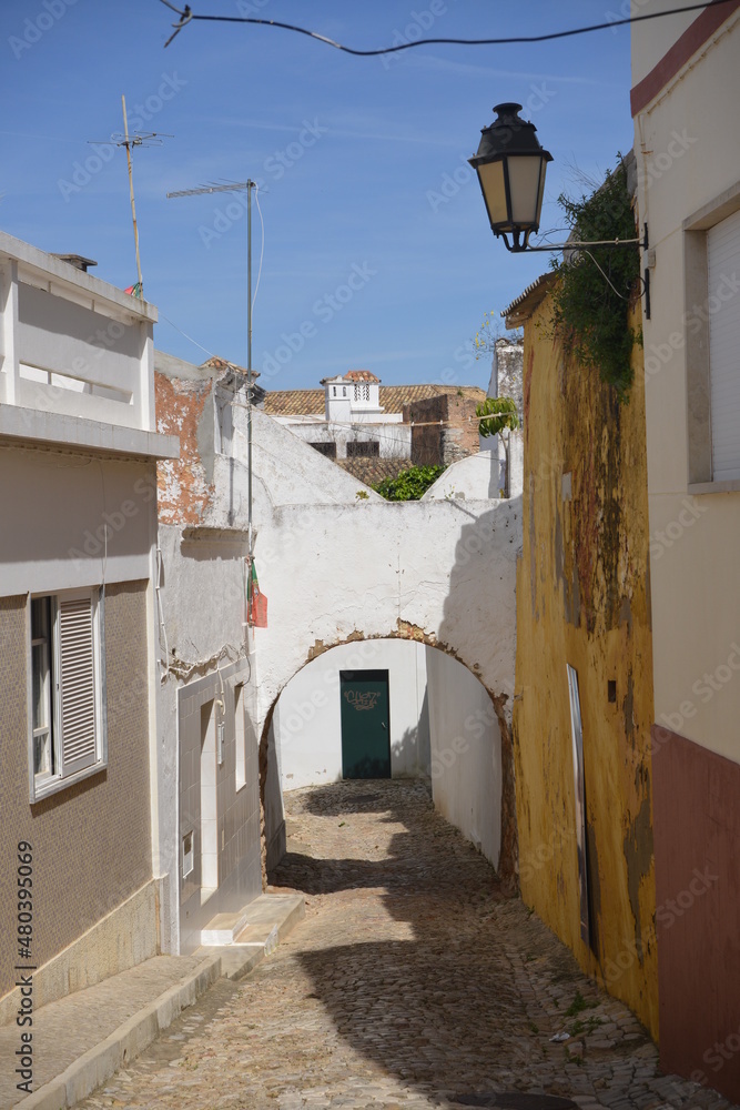 narrow street in an old town in the Algarve