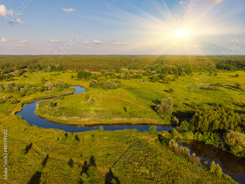 Fototapeta Naklejka Na Ścianę i Meble -  River bend surrounded by fields