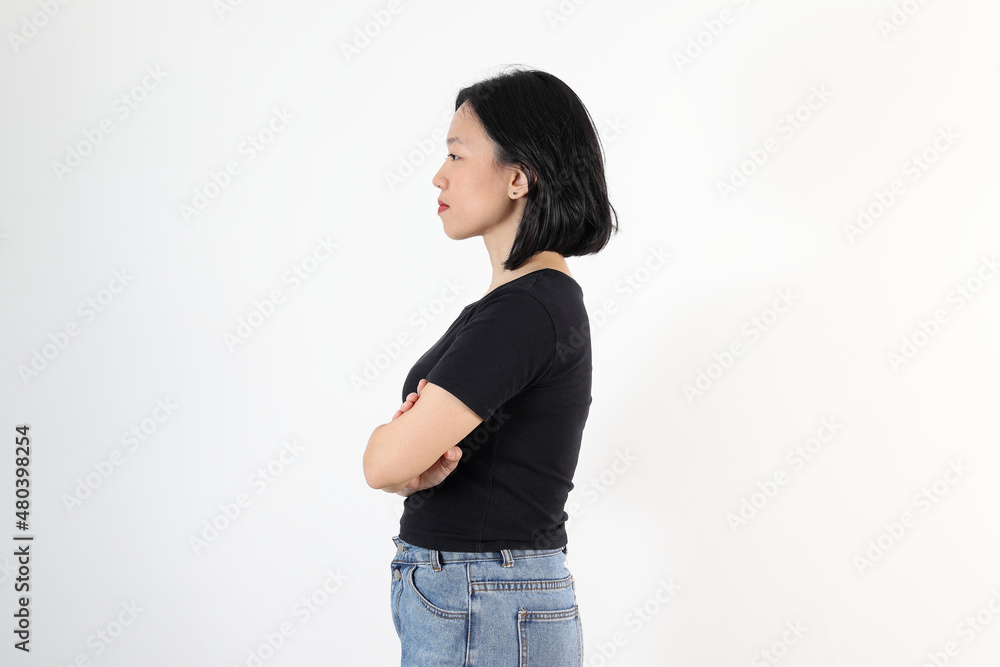 Young attractive south east asian woman pose face expression emotion on white background Young attractive south east asian woman pose face expression emotion on white background