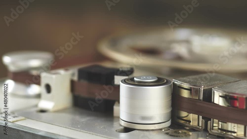 Old vintage reel-to-reel player. Tape recorder with spools. Bobbin tape recorder.	