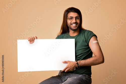 Healthy arab guy got vaccinated, showing empty board