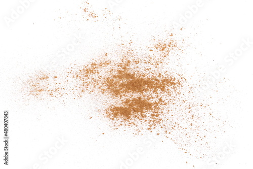 Cinnamon powder pile isolated on white 