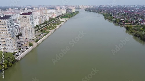 New residential buildings on the Kubanskaya embankment. The Kuban River. Flight over the city. Beautiful view of the river. Drone. photo