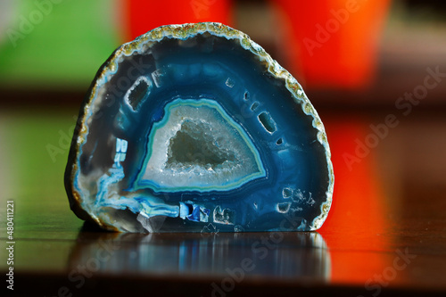 Blue Agate geode with transparent crystals, cross section, Beautiful blue abstract structure of mineral stone, isolated close-up ornament, 