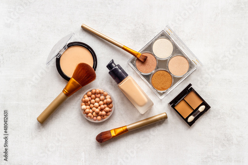 Flat lay of decorative makeup cosmetic products, top view