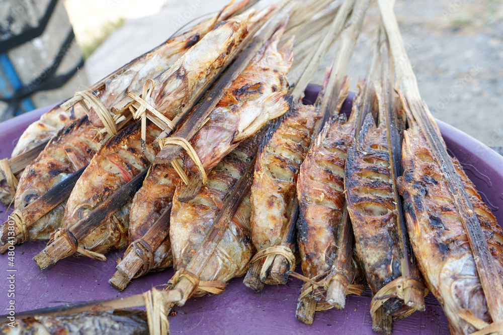 Grilled tilapia, which is a freshwater fish, is grilled using charcoal fire and covered with soy sauce and chili sauce which tastes sweet and spicy. This fish contains a lot of protein. Grilled tilapia, which is a freshwater fish, is grilled using charcoal fire and covered with soy sauce and chili sauce which tastes sweet and spicy. This fish contains a lot of protein.