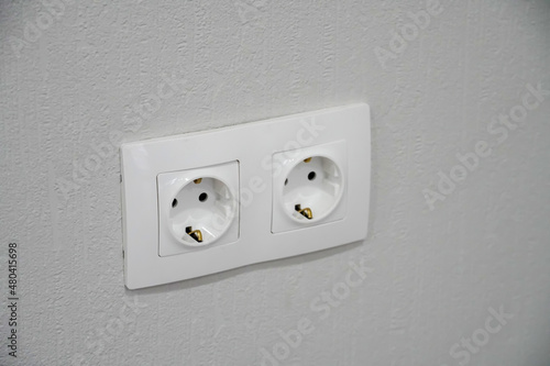 Installing and replacing an electrical outlet in a house during renovation