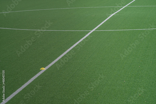Fototapeta Naklejka Na Ścianę i Meble -  Partial image of green artificial turf in sports stadium
