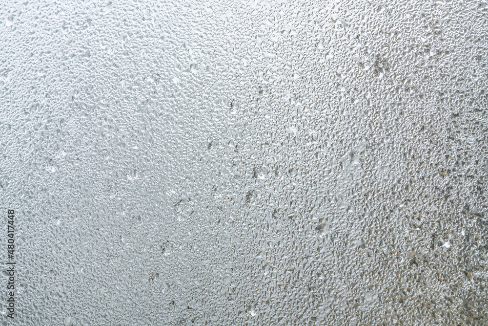 raindrops on steamed window in a rainy day raindrops on steamed window in a rainy day