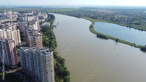 New residential buildings on the Kubanskaya embankment. The Kuban River. Flight over the city. Beautiful view of the river. Drone. photo