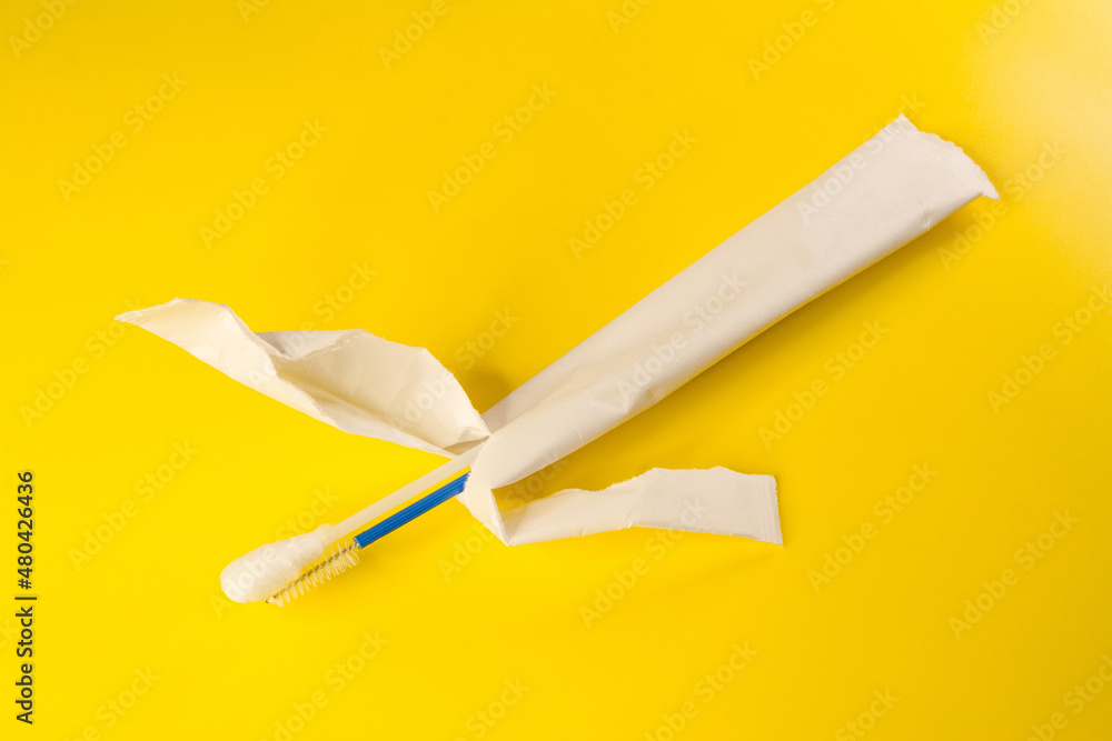Disposable gynecological brush and tampon for a visit to the gynecologist Disposable gynecological brush and tampon for a visit to the gynecologist