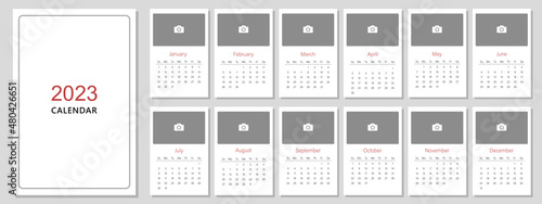 Calendar template for the year 2023. A place for a photo. A set of pages for 12 months of 2023. Vector illustration. The week starts on Sunday.