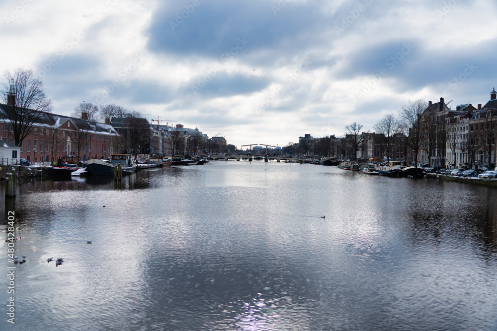 View over the Amstel river in the historic city center of Amsterdam