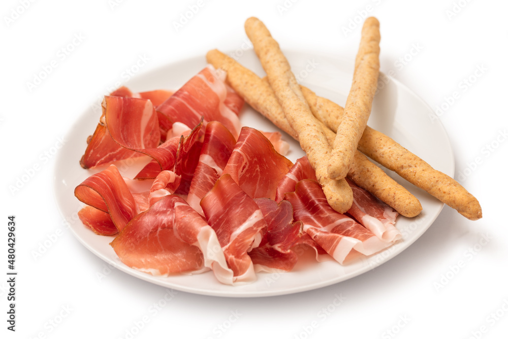 Grissini e speck, tipico salume alpino dell'alto Adige, Cibo Italiano Grissini e speck, tipico salume alpino dell'alto Adige, Cibo Italiano