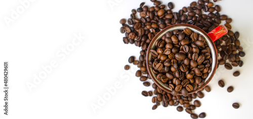 coffee cup with beans isolated on white background