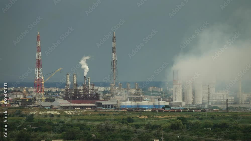 Oil and gas refinery plant with chimney smoke, Business petrochemical industrial, power and fuel energy, Ecosystem and healthy environment concepts, 4k Oil and gas refinery plant with chimney smoke, Business petrochemical industrial, power and fuel energy, Ecosystem and healthy environment concepts, 4k