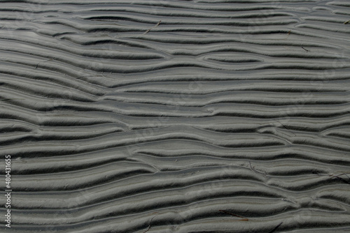 Sand surface after low tide - sand beach pattern