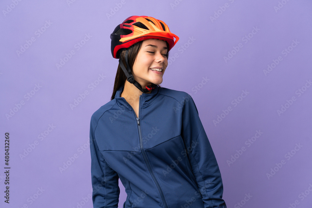 Teenager cyclist girl looking side Teenager cyclist girl looking side