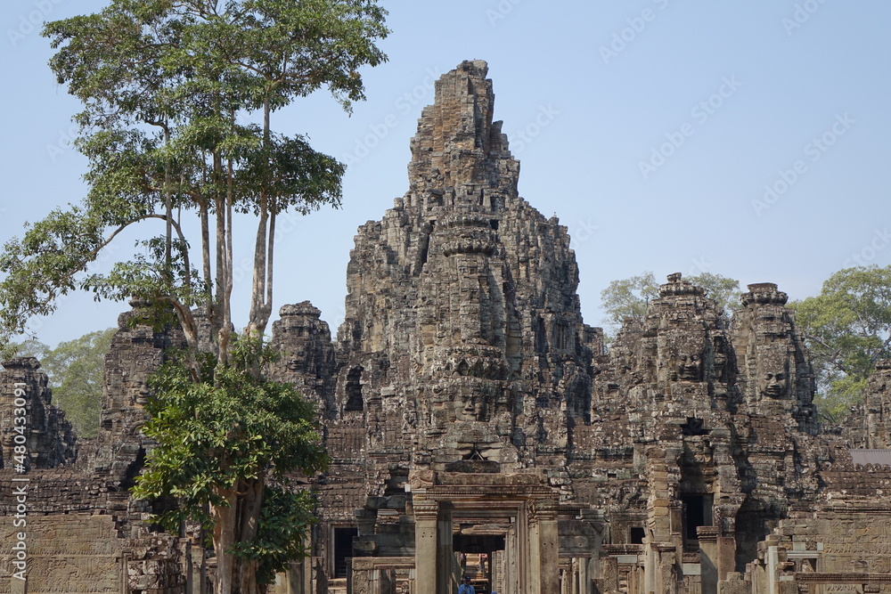 Adventure of exploring mystic Bayon temple in the impressive Khmer ruin city Angkor Thom (horizontal image), Siem Reap, Cambodia Adventure of exploring mystic Bayon temple in the impressive Khmer ruin city Angkor Thom (horizontal image), Siem Reap, Cambodia