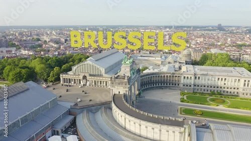 Inscription on video. Brussels, Belgium. Park of the Fiftieth Anniversary. Park Senkantoner. The Arc de Triomphe of Brussels (Brussels Gate). Knitted texture inscription, Aerial View, Point of intere photo