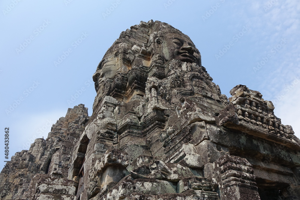 Fototapeta premium Adventure of exploring mystic Bayon temple in the impressive Khmer ruin city Angkor Thom (horizontal image), Siem Reap, Cambodia