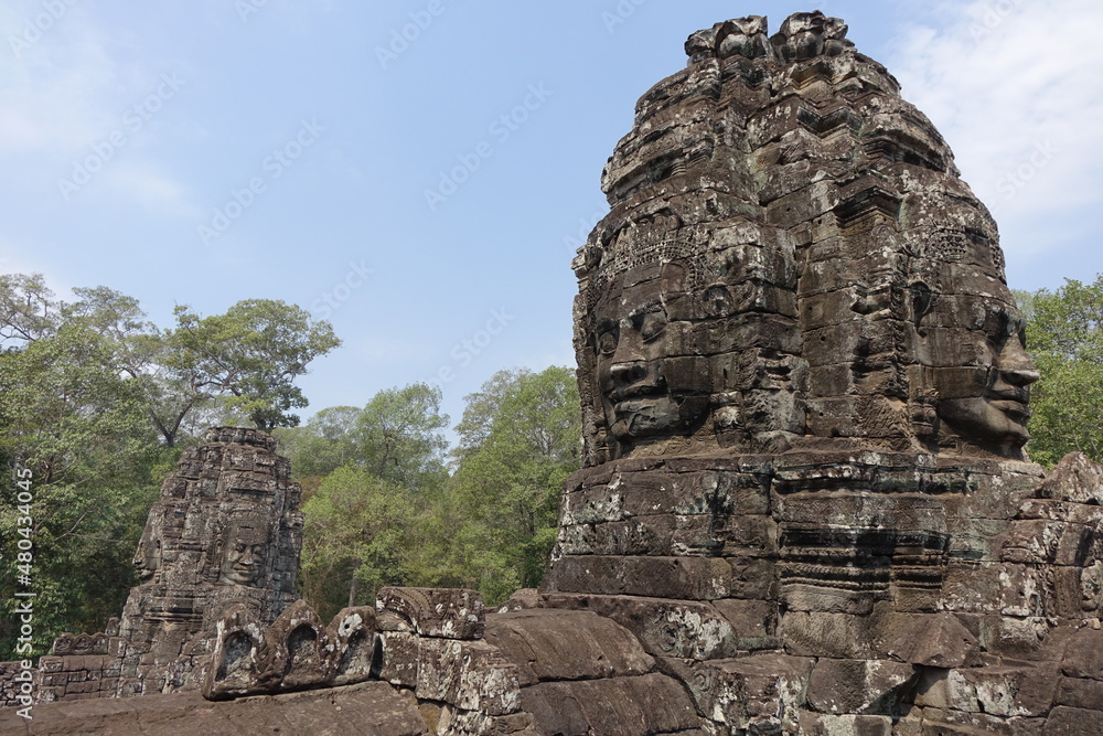 Adventure of exploring mystic Bayon temple in the impressive Khmer ruin city Angkor Thom (horizontal image), Siem Reap, Cambodia Adventure of exploring mystic Bayon temple in the impressive Khmer ruin city Angkor Thom (horizontal image), Siem Reap, Cambodia